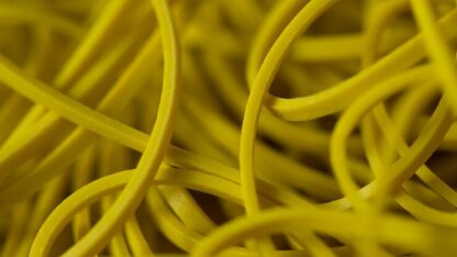 Joe Rindfleisch's SIZE 16 Rainbow Rubber Bands (Russell Leeds -Yellow ) by Joe Rindfleisch - Trick - Image 2